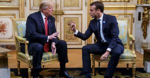 US President Donald Trump (L) speaks s with French president Emmanuel Macron prior to their meeting at the Elysee Palace in Paris, on November 10, 2018.