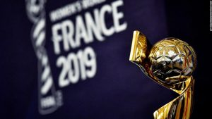TOPSHOT - Olympique Lyonnais' French defender Wendie Renard (C) holds the trophy with teammates as they celebrate their victory after the UEFA Women's Champions League final football match Vfl Wolfsburg vs Olympique Lyonnais at the Valeriy Lobanovsky stadium in Kiev on May 24, 2018. - Olympique Lyonnais won 4-1, their third trophy in a row. (Photo by FRANCK FIFE / AFP)        (Photo credit should read FRANCK FIFE/AFP/Getty Images)